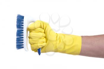 Cleaning brush in hand isolated on white