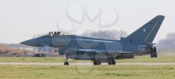 LEEUWARDEN, NETHERLANDS - APRIL 11, 2016: German Air Force Eurofighter landing during the exercise Frisian Flag. The exercise is considered one of the most important NATO training events this year.