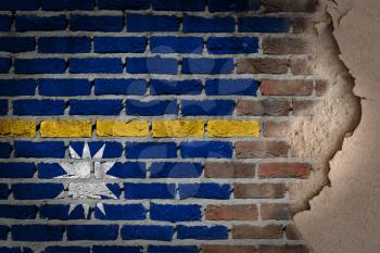 Dark brick wall texture with plaster - flag painted on wall - Nauru
