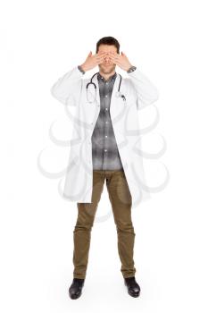 Doctor isolated on white - Sees no evil - Concept for not rocking the boat in medical circles