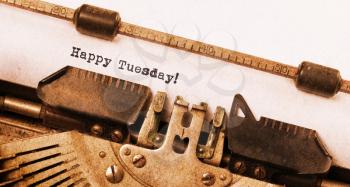 Vintage typewriter close-up - Happy Tuesday, concept of motivation