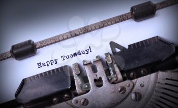 Vintage typewriter close-up - Happy Tuesday, concept of motivation