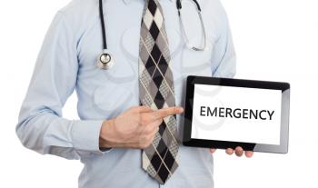 Doctor, isolated on white backgroun,  holding digital tablet - Emergency