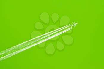 Large aircraft flying in sky, 4 stripes in the sky - Bright green sky