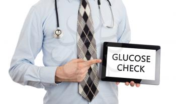 Doctor, isolated on white backgroun,  holding digital tablet - Glucose check