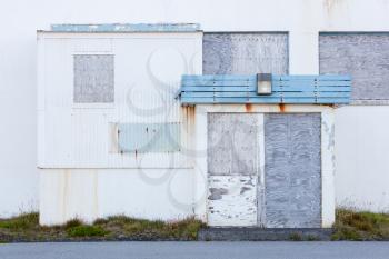 Front view of a boarded-up abandoned building in Iceland - Old USAF base