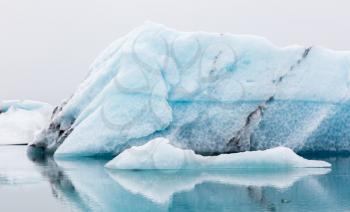 Jokulsarlon is a large glacial lake in southeast Iceland - Ice breaking of a glacier