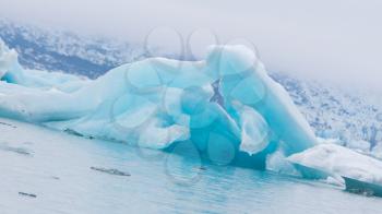 Jokulsarlon is a large glacial lake in southeast Iceland - Ice breaking of a glacier