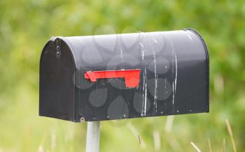 Rural mailbox on a metal post out on a country road