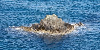 Small island at the westcoast of Iceland - Atlantic ocean