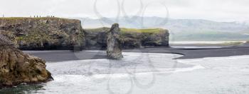 Big rock on the black beach near Vik, Iceland