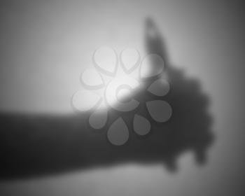 Silhouette behind a transparent paper - Blurred - Small pliers