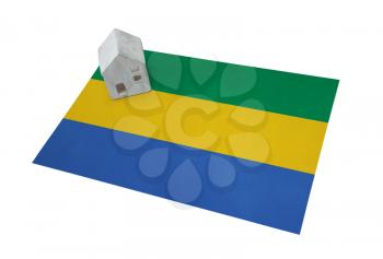 Small house on a flag - Living or migrating to Gabon