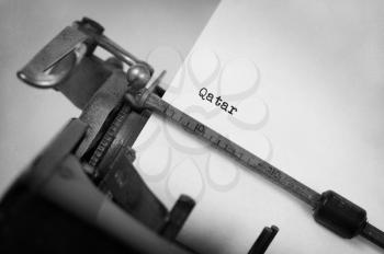 Inscription made by vintage typewriter, country, Qatar