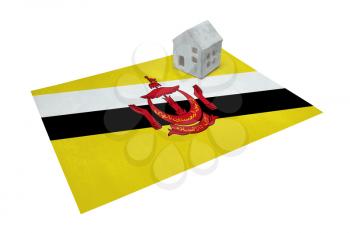 Small house on a flag - Living or migrating to Brunei