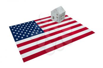 Small house on a flag - Living or migrating to USA