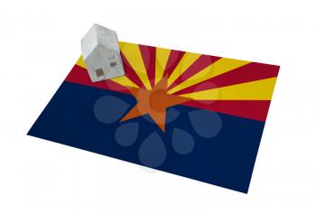 Small house on a flag - Living or migrating to Arizona