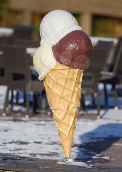 Ice cream cone in front of an ice cream bar