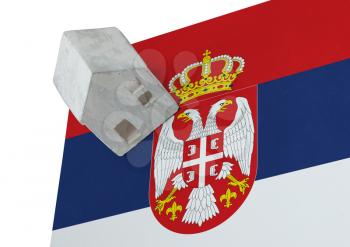 Small house on a flag - Living or migrating to Serbia