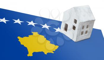 Small house on a flag - Living or migrating to Kosovo