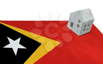 Small house on a flag - Living or migrating to East Timor