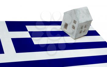 Small house on a flag - Living or migrating to Greece