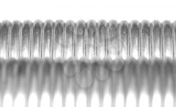 Two metal springs isolated on a white background, selective focus