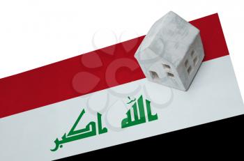 Small house on a flag - Living or migrating to Iraq