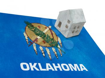 Small house on a flag - Living or migrating to Oklahoma