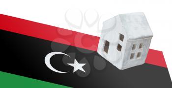 Small house on a flag - Living or migrating to Libya
