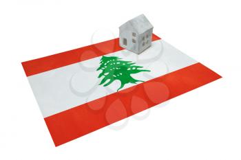 Small house on a flag - Living or migrating to Lebanon