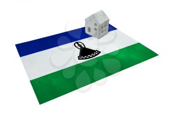 Small house on a flag - Living or migrating to Lesotho