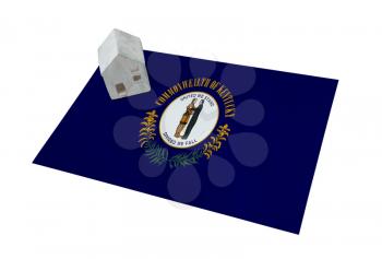 Small house on a flag - Living or migrating to Kentucky