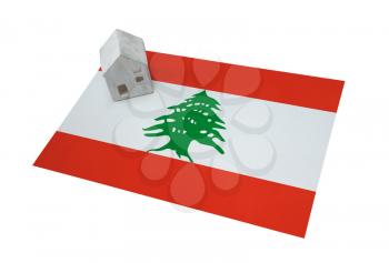 Small house on a flag - Living or migrating to Lebanon