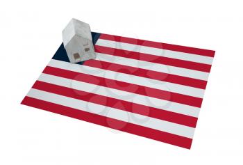 Small house on a flag - Living or migrating to Liberia