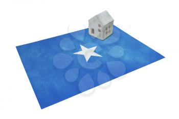 Small house on a flag - Living or migrating to Somalia
