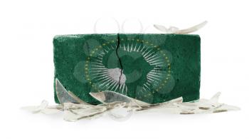 Brick with broken glass, violence concept, flag of African Union