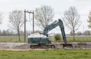 Excavator in construction site in the Netherlands
