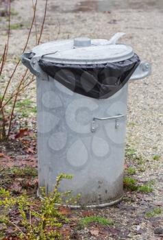 Metal rubbish bin in a park - the Netherlands