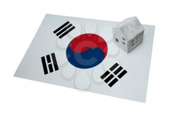 Small house on a flag - Living or migrating to South Korea