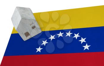 Small house on a flag - Living or migrating to Venezuela