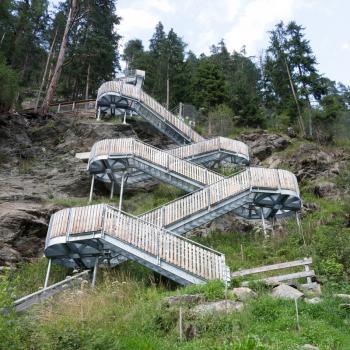 Metal stairs - Bridge over a waterfall in the Austrian Alps - Stuibenfall waterfall