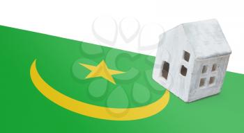 Small house on a flag - Living or migrating to Mauritania