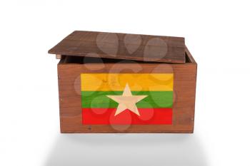 Wooden crate isolated on a white background, product of Myanmar