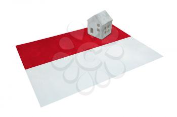 Small house on a flag - Living or migrating to Monaco