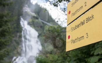 Waterfall in the Austrian Alps - Selective focus - Stuibenfall waterfall