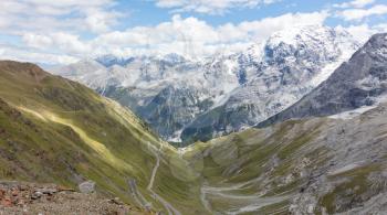 View from the top of famous Italian Stelvio High Alpine Road, elevation of 2,757 m above sea level. Stelvio Pass, South Tyrol, province of Sondrio, Ortler Alps, Italy, Europe.
