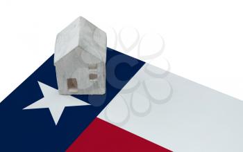 Small house on a flag - Living or migrating to Texas