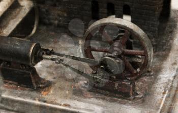 Vintage steam engine, selective focus on the wheel