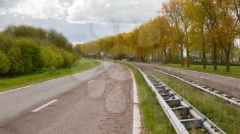 Abandoned road in the Netherlands, not being used for a long time